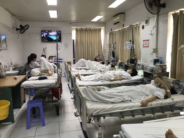 Image of a patient being treated at a medical facility in Hanoi. One bed per patient is the goal of many central hospitals. Photo: Thuy Linh