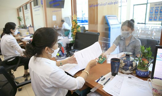 Tập trung nguồn lực thực hiện chính sách cải cách tiền lương. Ảnh: Nguyễn Quang
