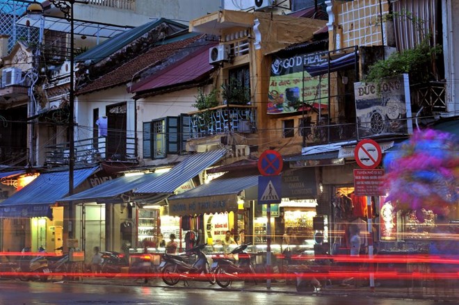 Hang Dao Street (Hanoi), a bustling street, famous for its old silk dyeing center, now sells many products. Photo: Viet Van