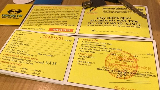 Bảo hiểm xe máy bắt buộc. Ảnh: Lê Phú