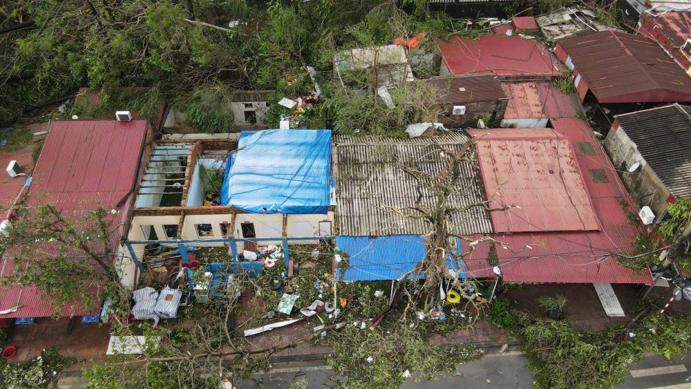 Many houses in Do Son had their roofs blown off and had to be temporarily reinforced after the storm.