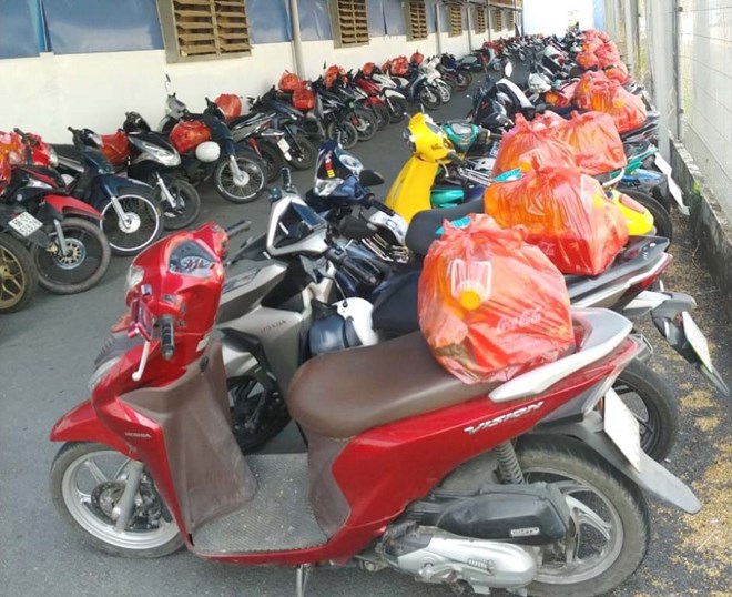 Tet gifts are neatly placed on the vehicles of union members and employees of Hwaseung Rach Gia Company Limited on the occasion of Lunar New Year 2024. Photo: My Hanh