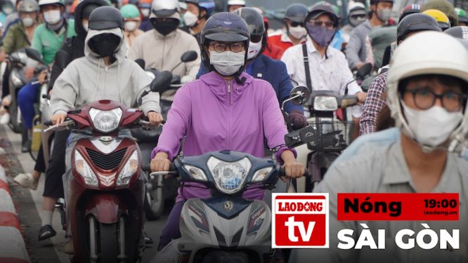 Hot in Saigon: Roads at the gateway to Ho Chi Minh City are congested during the days before Tet