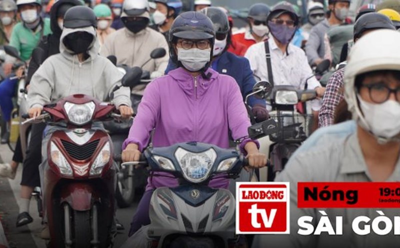 Hot in Saigon: Roads at the gateway to Ho Chi Minh City are congested during the days before Tet