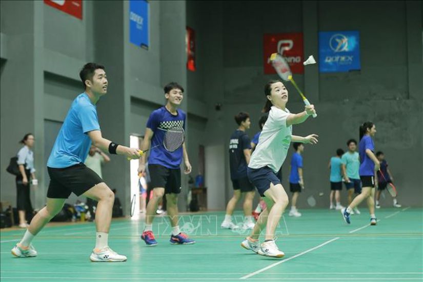 Two tennis players Nguyen Thuy Linh and Le Duc Phat. Photo: VNA