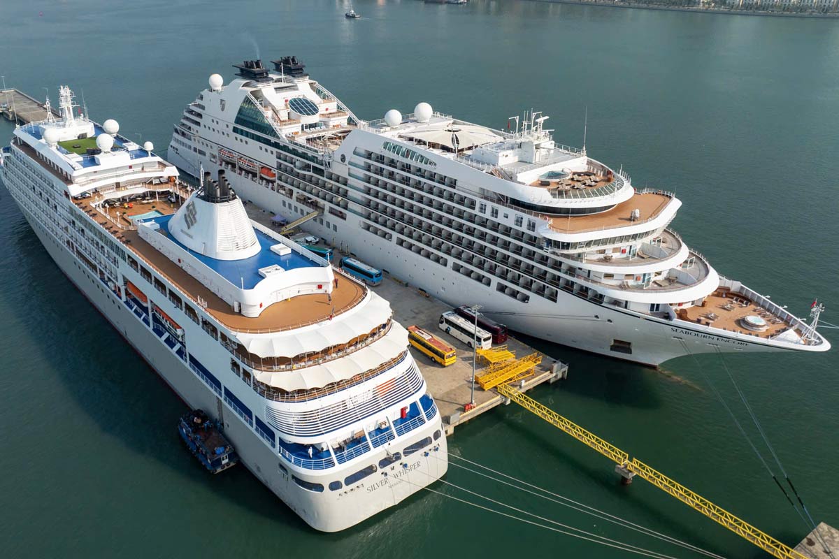 Two Bahamas cruise ships Seabourn Encore and Silver Whisper docked at Ha Long International Cruise Port. Photo: Vu Bang