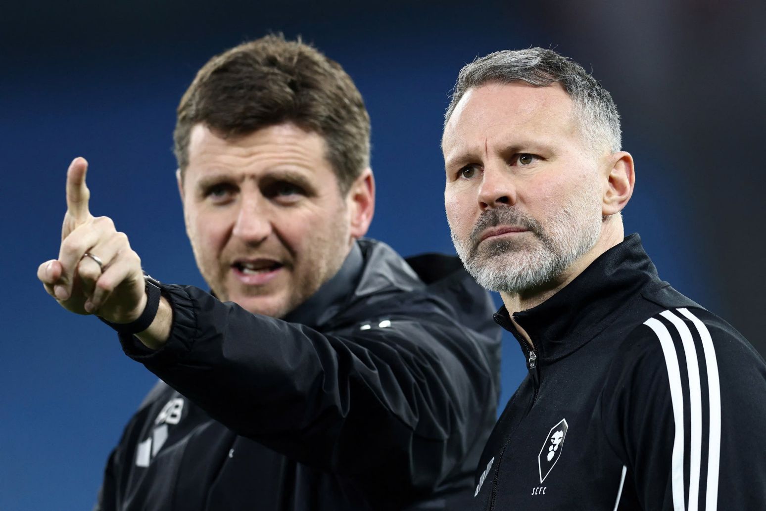 Ryan Giggs (right) plays both a leadership role and an assistant coach at Salford matches. Photo: AFP