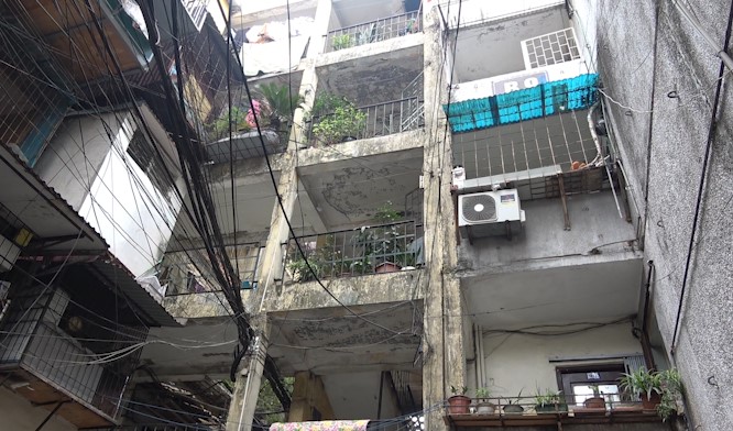 Waiting for the old, degraded apartment complex to be renovated