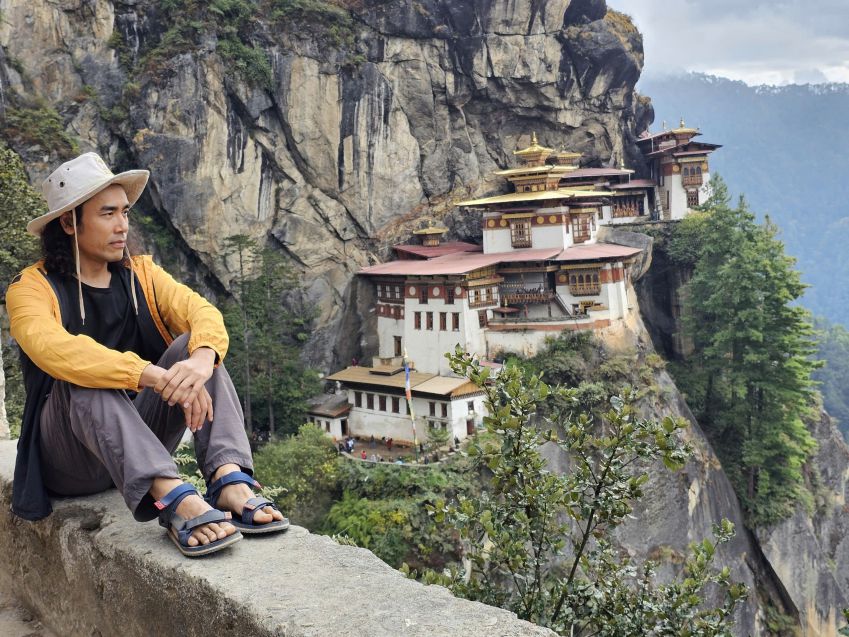 Noah Nguyen checks in at Taktsang Palphug Monastery located halfway up a mountain in Bhutan. Photo: Character provided
