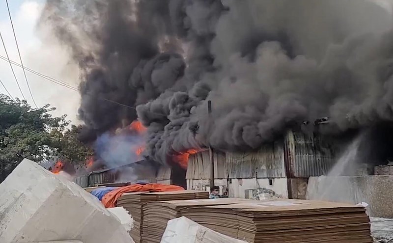 The scene of the wood company fire at noon.