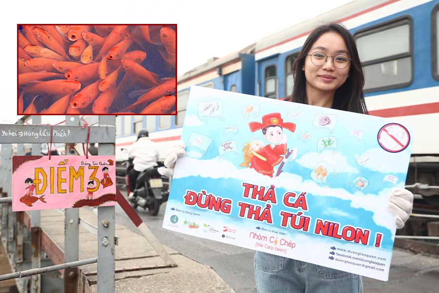 Hanoians release fish to see off the Kitchen Gods in a civilized way