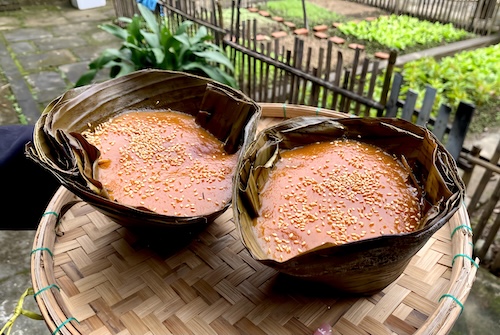 The traditional banh to production facility in Hoi An City is bustling with delicious batches of cakes. Photo: Minh Thu
