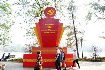 Hanoi streets are brightly decorated to celebrate the Party and the Year of the Snake. Photo: Ai Van