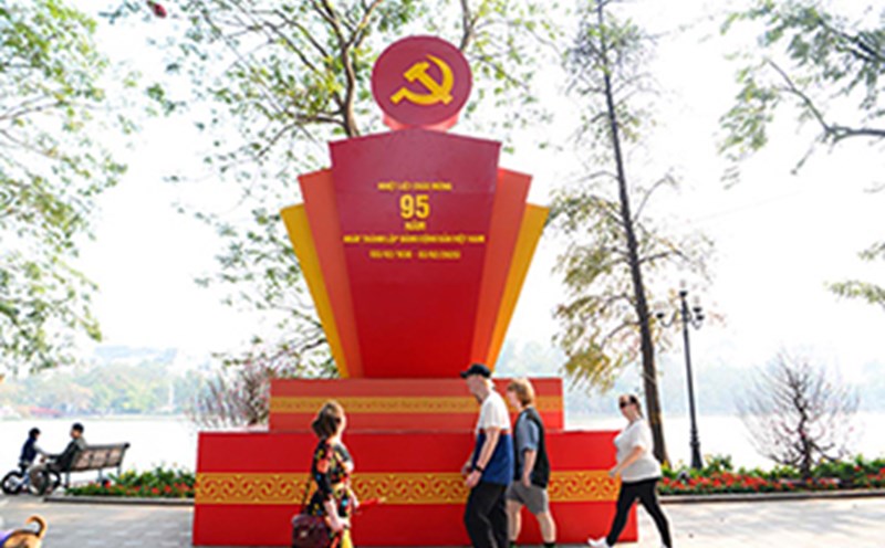 Hanoi streets are brightly decorated to celebrate the Party and the Year of the Snake. Photo: Ai Van
