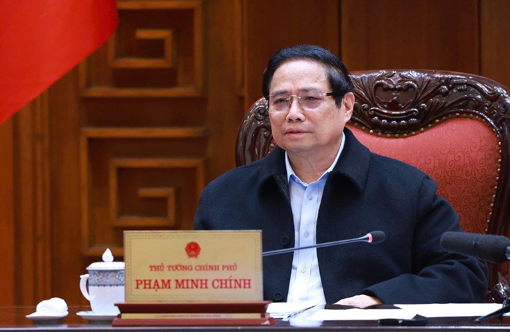 Prime Minister Pham Minh Chinh delivers a concluding speech at a meeting on the implementation of the Long Thanh International Airport project. Photo: VGP/Nhat Bac