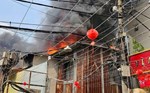 Cháy nhà ở trung tâm TPHCM chiều 29 Tết