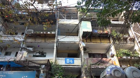 Living in fear in an old, rundown apartment complex in Hanoi