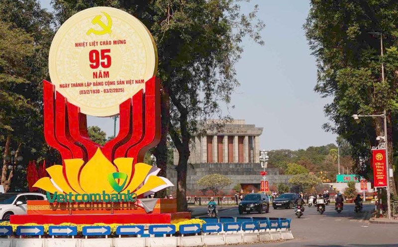 Hanoi streets are brightly decorated to celebrate the Party and the Year of the Snake. Photo: Hai Nguyen