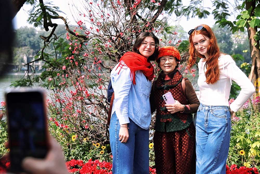 Hanoi tourist attractions crowded with visitors on the second day of Tet