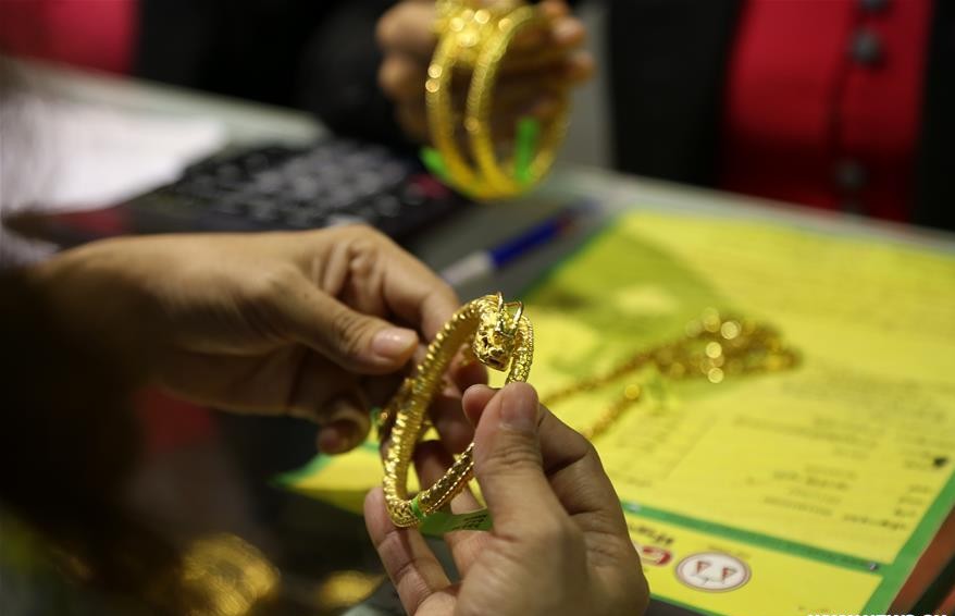 Gold prices are expected to break the $3,000/ounce mark in February. Photo: Xinhua