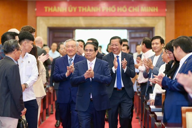 Prime Minister Pham Minh Chinh attends the conference announcing the resolution on building an international financial center. Photo: Hoang Trieu