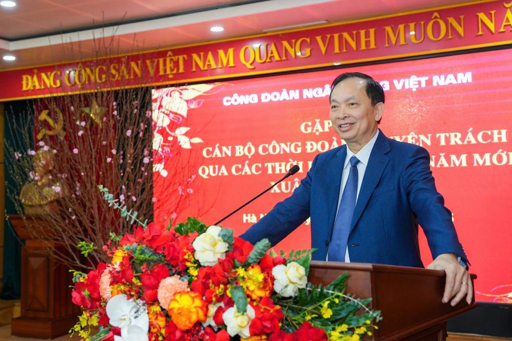 Mr. Dao Minh Tu - Permanent Deputy Governor of the State Bank, Chairman of the Vietnam Banking Trade Union - spoke at the program. Photo: Lan Vu
