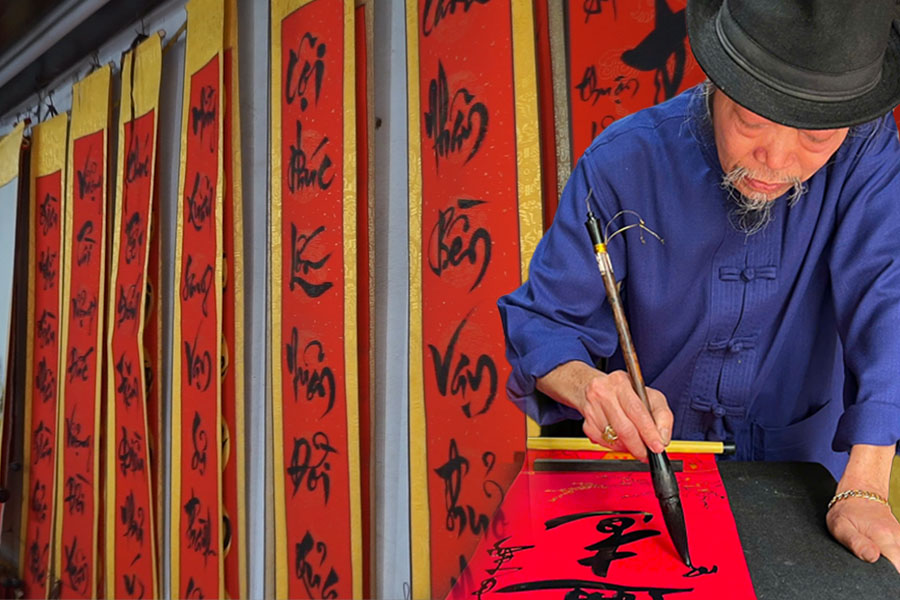 Calligrapher advises on appropriate calligraphy for the occasion of Tet At Ty 2025.