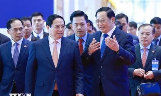 Thủ tướng Chính phủ Phạm Minh Chính và Thủ tướng Lào Sonexay Siphandone. Ảnh: TTXVN