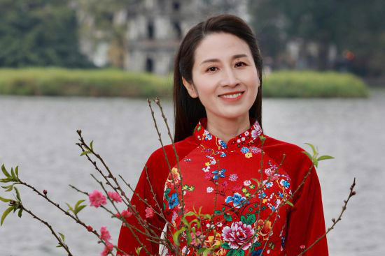 The Ao Dai enhances the beauty of Vietnamese women. Photo: Thu Hong