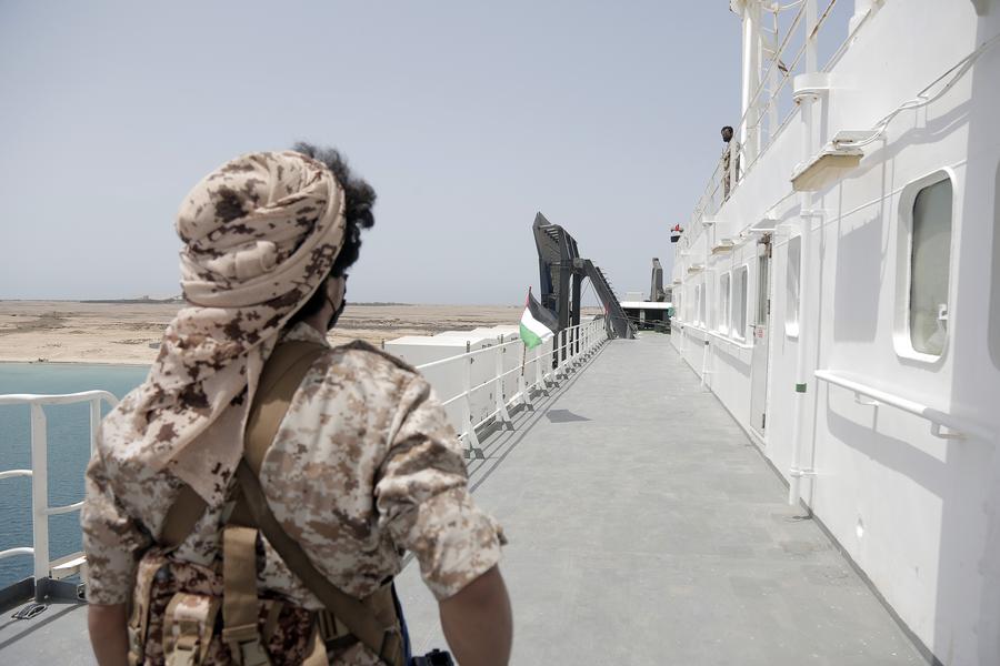 A member of the Houthi group stood on the deck of the Galaxy Leader ship near the port city of Hodeidah in western Yemen. Photo: Xinhua