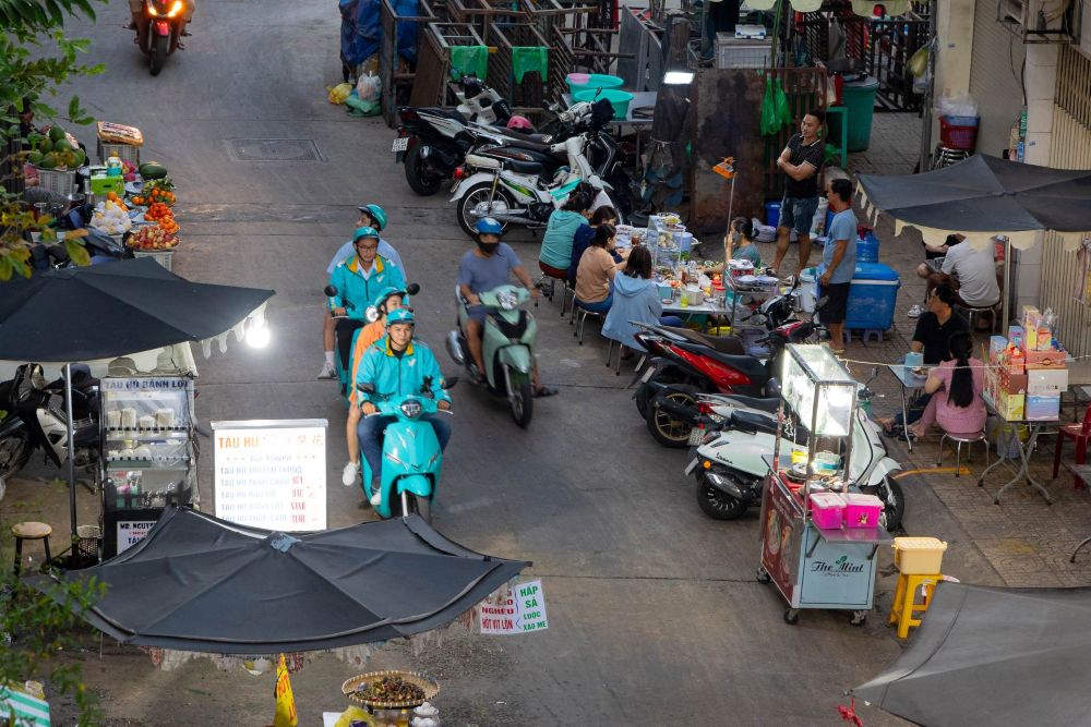 Ảnh: Chạy Xanh SM Bike ngoài giờ học giúp nhiều sinh viên trang trải thêm cho cuộc sống