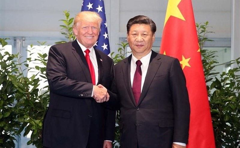 Chinese President Xi Jinping and US President Donald Trump on the sidelines of the G20 summit in Germany, July 8, 2017. Photo: Xinhua