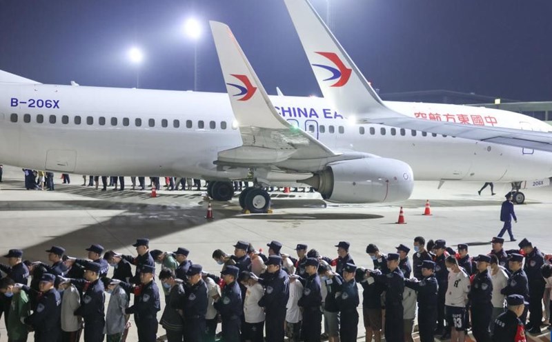 taken the online fraud suspects home at Phnom Penh International Airport, Cambodia, on April 13, 2025. Photo: Xinhua