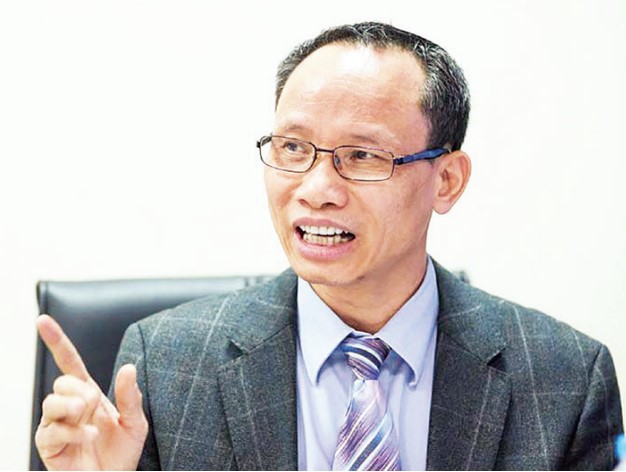 TS Can Van Luc - chuyen gia kinh te, Thanh vien Hoi dong tu van chinh sach tai chinh - tien te Quoc gia. Anh: TUNG GIANG