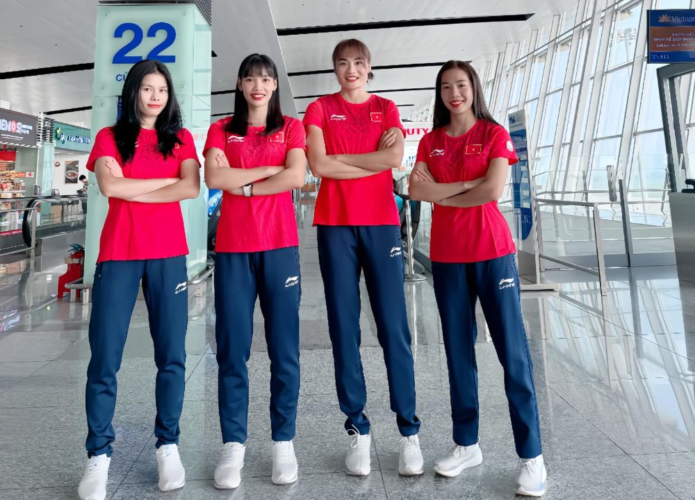 To chay 4x400m nu dang tap huan tai Phap. Anh: NVCC