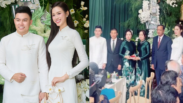 Miss Do Thi Ha, the groom of Viet Vuong took a photo with both parents.