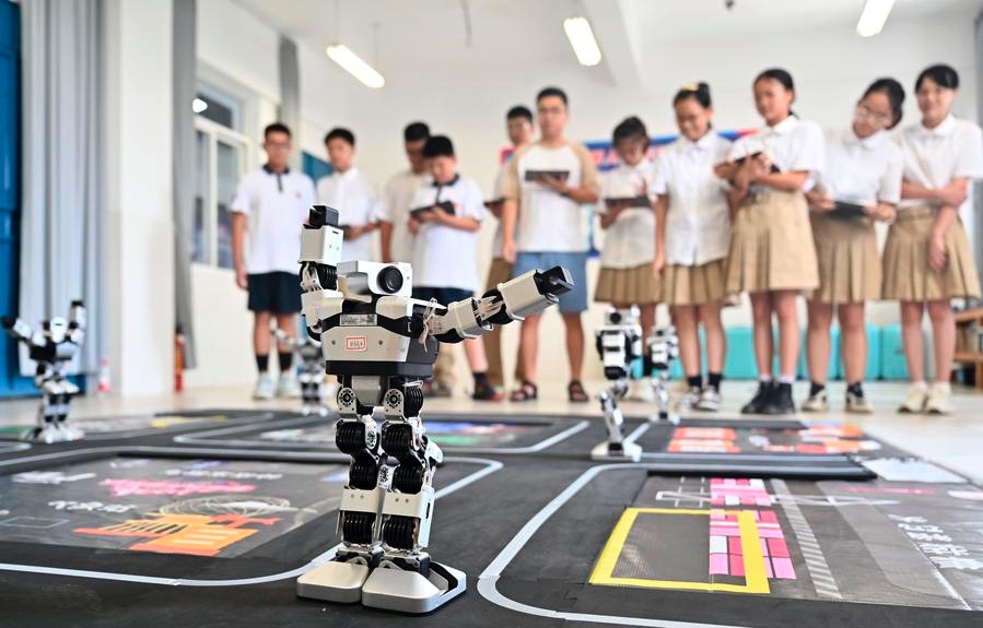 Not only in high-tech industries, China has brought AI to classrooms to help teachers and students in teaching and learning. Photo: Xinhua