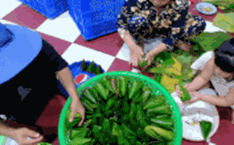 Traditional cakes are wrapped with the hearts of the people attending the Nguyen Trung Truc festival.