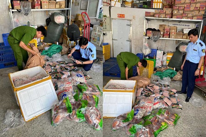Xu phat gan 70 trieu dong hai co so kinh doanh thuc pham nhap lau o Ha Noi. Anh: Chi Cuc QLTT Ha Noi