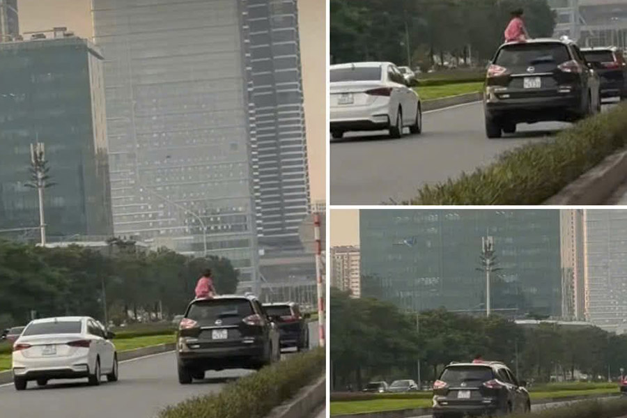 走行中の車の屋根に登る少女の写真。写真:ハノイ警察