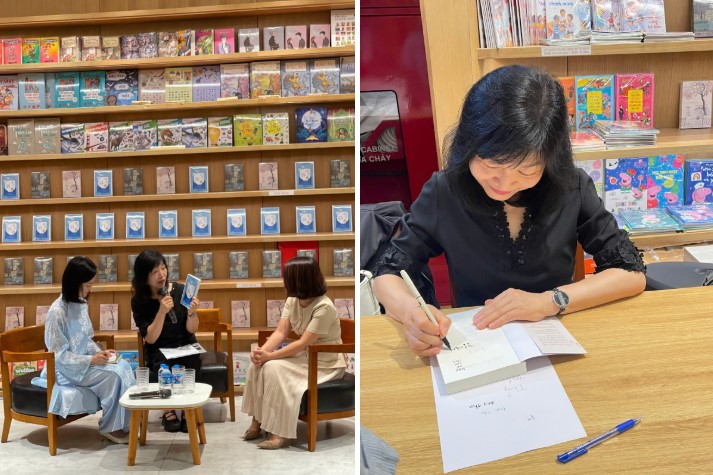 Nha van gioi thieu cuon sach “Phut biet ly”va ki ten cho doc gia trong su kien. Anh: Ho Thu  