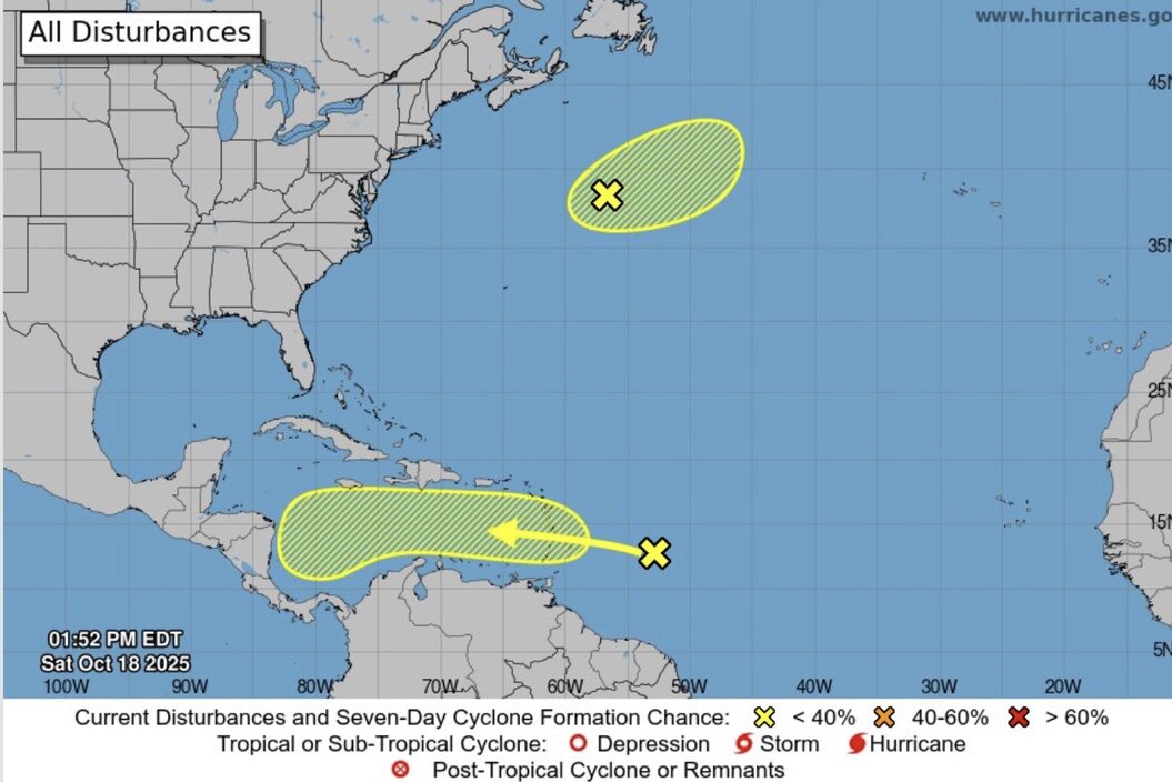 Low pressure 98L (left) and a non-tropical depression several hundred miles off the northeastern coast of the United States. Photo: US National Hurricane Center