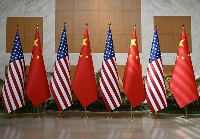 Drapeau americain et chinois. Photo: Xinhua