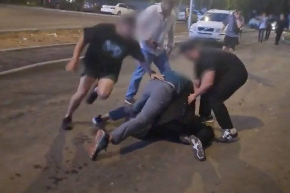 Russian law enforcement officers are suppressing the suspect. Photo cut from video of the Russian Federal Security Service