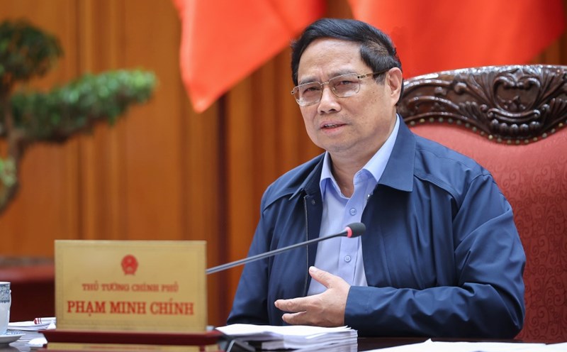 Politburo member and Prime Minister Pham Minh Chinh emphasized the need to attract and encourage talented and skilled people to participate in working and advising on institutions, law making and enforcement. Photo: Nhat Bac