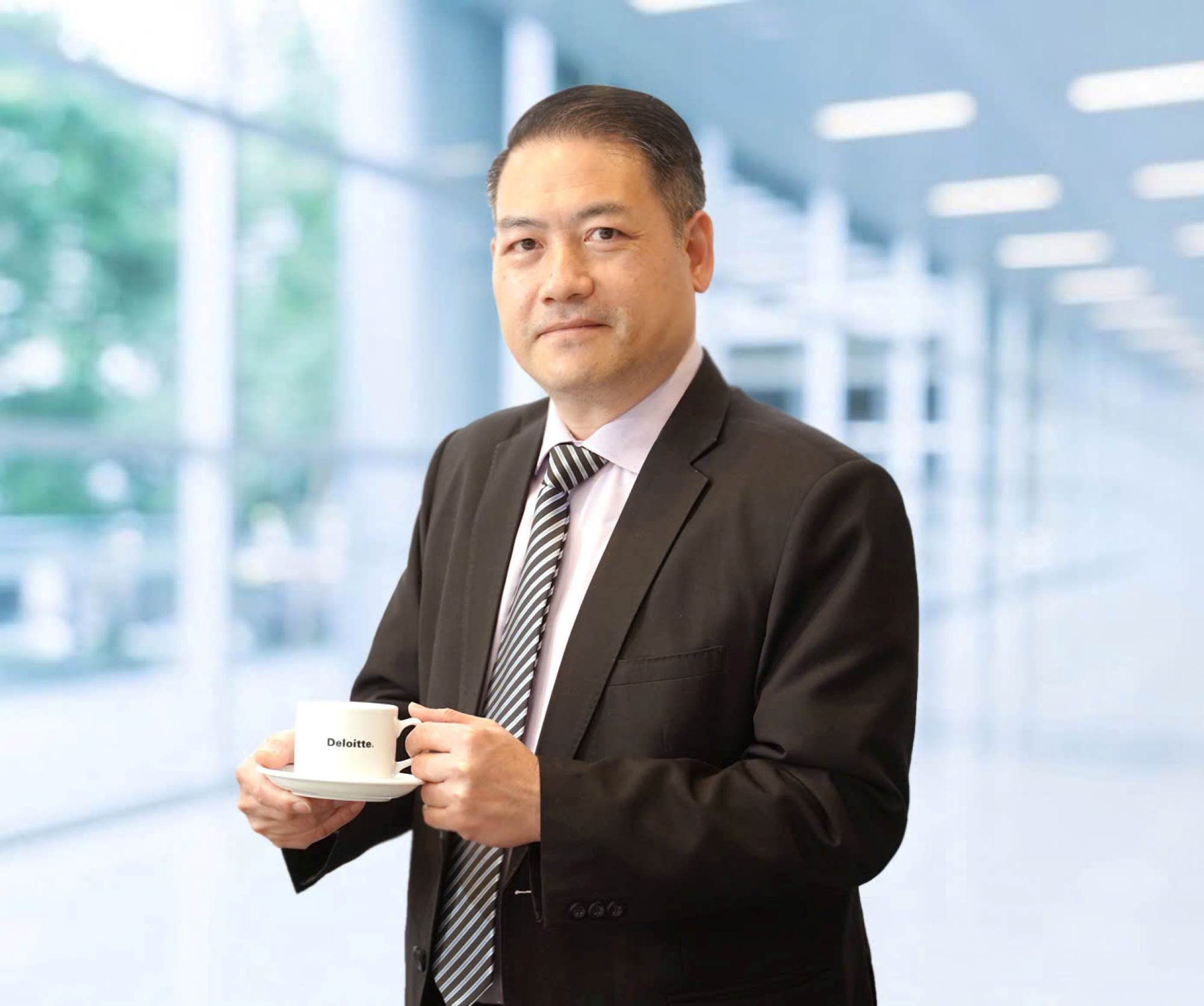 Ong Bui Ngoc Tuan, Pho Tong Giam doc, Dich vu Tu van Thue & Phap ly, Deloitte Viet Nam.