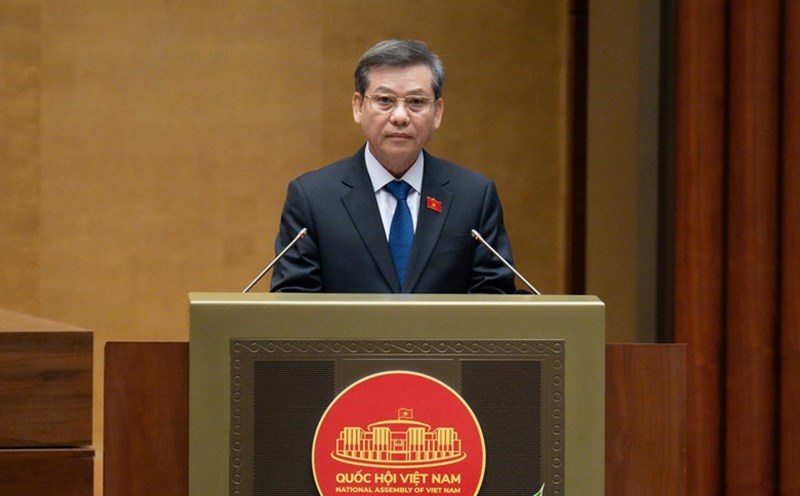 Chief Justice of the Supreme People's Court Le Minh Tri presented the draft Law on Assets (amended). Photo: Quochoi.vn