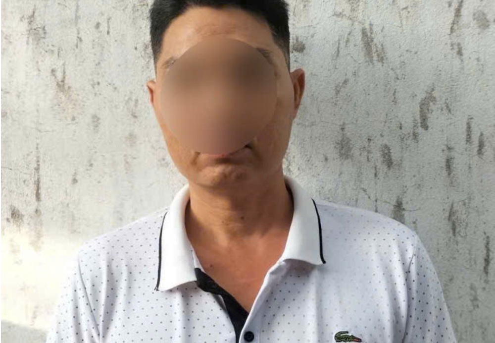 Nguyen Chi Nghiep has a previous conviction for "Gambling" but his criminal record has not been cleared. Photo: Provided by the police