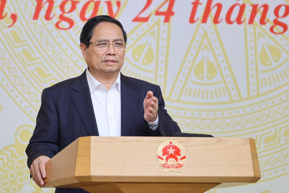 Politburo member and Prime Minister Pham Minh Chinh delivered a concluding speech at the conference with ministries, branches, localities and enterprises on solutions for breakthrough development of social housing. Photo: Nhat Bac