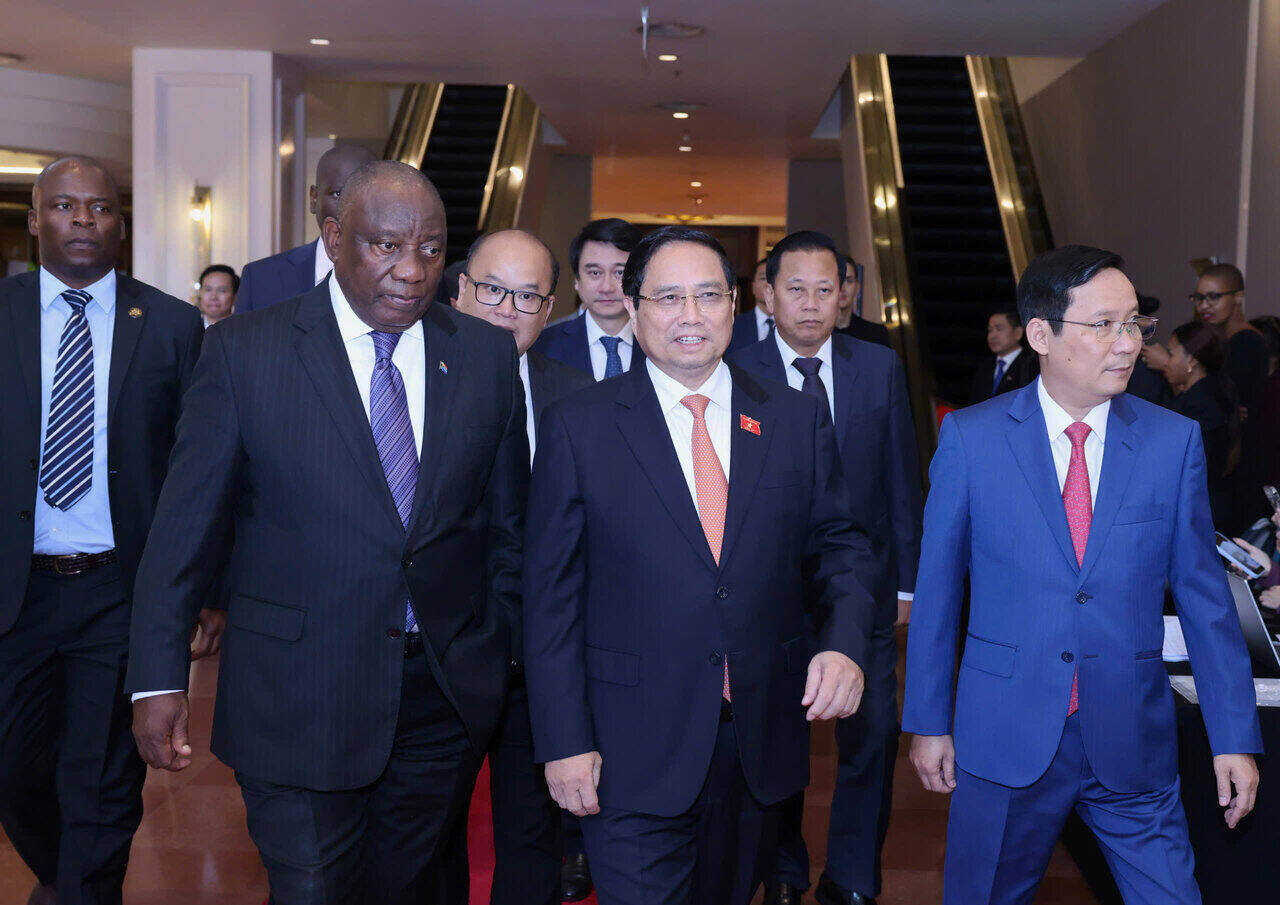 Politburo member, Prime Minister Pham Minh Chinh and South African President Cyril Ramaphosa attended the Vietnam - South Africa Business Forum. Photo: Hai Nguyen